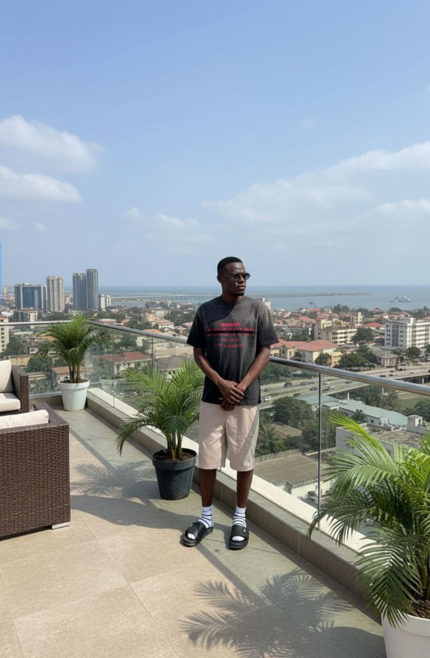 After — on a Lagos rooftop overlooking the ocean